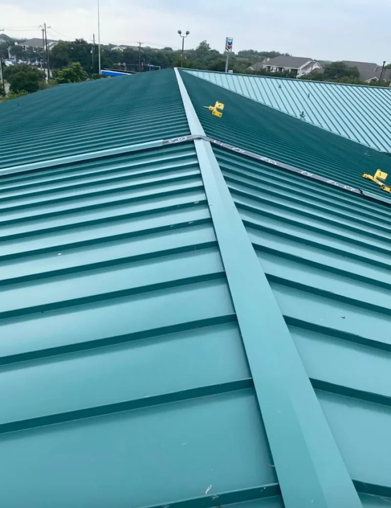 Green commercial metal roof ridge and valley for Metal Roof Repair in Benton